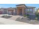 Single-story home with stone accents and desert landscaping at 16866 S 180Th Ave, Goodyear, AZ 85338