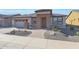 Single story home with stone facade at 16866 S 180Th Ave, Goodyear, AZ 85338