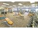 Fitness center with various cardio and weight training equipment at 16866 S 180Th Ave, Goodyear, AZ 85338