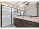 Elegant bathroom with dual sinks and a large mirror at 16866 S 180Th Ave, Goodyear, AZ 85338