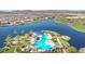 Aerial view of community pool and lakefront property at 16866 S 180Th Ave, Goodyear, AZ 85338