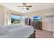 Relaxing bedroom with a king-size bed and water views at 16866 S 180Th Ave, Goodyear, AZ 85338