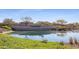 Gated entrance to CantaMia community featuring a water feature and landscaping at 16866 S 180Th Ave, Goodyear, AZ 85338
