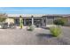 Relaxing backyard oasis with covered patio and desert landscaping at 16866 S 180Th Ave, Goodyear, AZ 85338