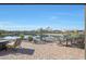 Relaxing backyard patio with pond view at 16866 S 180Th Ave, Goodyear, AZ 85338