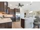 Modern kitchen with stainless steel appliances and an island at 16866 S 180Th Ave, Goodyear, AZ 85338