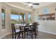 Bright breakfast nook with table and chairs, offering scenic views at 16866 S 180Th Ave, Goodyear, AZ 85338