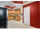 Kitchen with wood cabinets, granite counters and pantry at 4202 N 21St St # 1, Phoenix, AZ 85016