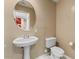 Simple bathroom with pedestal sink and toilet at 4202 N 21St St # 1, Phoenix, AZ 85016