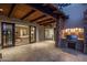 Covered patio with an outdoor kitchen and access to the interior of the home at 9290 E Thompson Peak Pkwy # 493, Scottsdale, AZ 85255