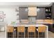 Modern kitchen with large island and marble countertops at 6525 E Cave Creek Rd # 6, Cave Creek, AZ 85331