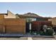 Modern home with wood and metal siding, attached garage, and desert landscaping at 6525 E Cave Creek Rd # 6, Cave Creek, AZ 85331