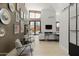 Bright living room with hardwood floors, fireplace, and large windows at 6525 E Cave Creek Rd # 6, Cave Creek, AZ 85331