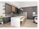 Modern kitchen with large island and dark cabinetry at 6525 E Cave Creek Rd # 6, Cave Creek, AZ 85331