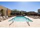 Inviting community pool with lounge chairs and mountain views at 6525 E Cave Creek Rd # 6, Cave Creek, AZ 85331