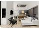 Modern living room with fireplace, large sectional sofa and high ceilings at 6525 E Cave Creek Rd # 6, Cave Creek, AZ 85331