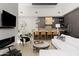 Open floor plan boasts modern kitchen with island and spacious living area at 6525 E Cave Creek Rd # 6, Cave Creek, AZ 85331