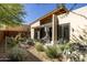 Landscaped backyard with patio and desert plants at 6525 E Cave Creek Rd # 6, Cave Creek, AZ 85331