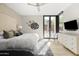 Bright bedroom with plush carpet and private access to patio at 6525 E Cave Creek Rd # 6, Cave Creek, AZ 85331
