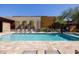 Inviting community pool with lounge chairs and spa at 6525 E Cave Creek Rd # 6, Cave Creek, AZ 85331