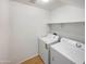 Bright laundry room with washer and dryer at 1842 N 77Th Gln, Phoenix, AZ 85035