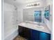 Bathroom with double vanity, shower, and bathtub at 1842 N 77Th Gln, Phoenix, AZ 85035