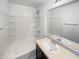 Clean bathroom with tub, sink and vanity at 1842 N 77Th Gln, Phoenix, AZ 85035
