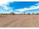 Vacant lot with desert landscape and distant structures at 8066 N Palo Verde Rd, Florence, AZ 85132