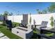 Relaxing fire pit area with seating for multiple guests at 1004 E Tempe Dr, Tempe, AZ 85281