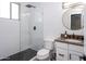 Modern bathroom with white subway tile and a hexagon shower floor at 1004 E Tempe Dr, Tempe, AZ 85281