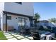 Backyard patio with dining area, fire pit and games at 1004 E Tempe Dr, Tempe, AZ 85281