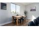 Charming dining area with a wooden table and four metal chairs at 1004 E Tempe Dr, Tempe, AZ 85281