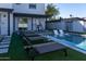 Private backyard oasis with a pool and plenty of lounge space at 1004 E Tempe Dr, Tempe, AZ 85281