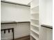 Large walk-in closet with shelves and hanging rods at 1004 E Tempe Dr, Tempe, AZ 85281