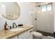 Bathroom with a walk-in shower and granite countertop at 1004 E Tempe Dr, Tempe, AZ 85281