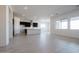 Modern kitchen boasts dark cabinetry and an island at 3636 W Summerside Rd, Laveen, AZ 85339