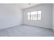 Spacious bedroom with large window and wood-look floors at 3636 W Summerside Rd, Laveen, AZ 85339
