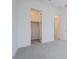 Bedroom with grey carpet and a walk-in closet at 3636 W Summerside Rd, Laveen, AZ 85339