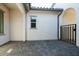Covered patio with paver stones and access gate at 3636 W Summerside Rd, Laveen, AZ 85339