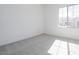 Bright bedroom with carpeted floors and large window at 3636 W Summerside Rd, Laveen, AZ 85339