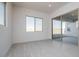 Bright bedroom with sliding door to backyard access at 3636 W Summerside Rd, Laveen, AZ 85339