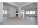 Open concept living space with high ceilings and columns at 3636 W Summerside Rd, Laveen, AZ 85339