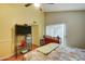 Main bedroom with high ceiling, ceiling fan and ample closet space at 2416 W Caribbean Ln # 1, Phoenix, AZ 85023