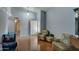 Bright living room with hardwood floors, vaulted ceiling and entryway view at 2416 W Caribbean Ln # 1, Phoenix, AZ 85023