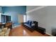 Living room with hardwood floors, vaulted ceilings, and a neutral color scheme at 2416 W Caribbean Ln # 1, Phoenix, AZ 85023