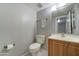 Clean bathroom with a toilet and vanity at 2416 W Caribbean Ln # 1, Phoenix, AZ 85023