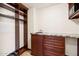 Convenient laundry room with built-in cabinets and granite countertop at 3044 Ironwood Rd, Carefree, AZ 85377