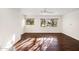 Well-lit bedroom featuring hardwood floors and dual-pane windows at 3044 Ironwood Rd, Carefree, AZ 85377