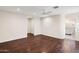 Spacious bedroom with hardwood floors, ceiling fan, and en-suite bathroom at 3044 Ironwood Rd, Carefree, AZ 85377