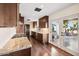 Modern kitchen with granite countertops and stainless steel appliances at 3044 Ironwood Rd, Carefree, AZ 85377